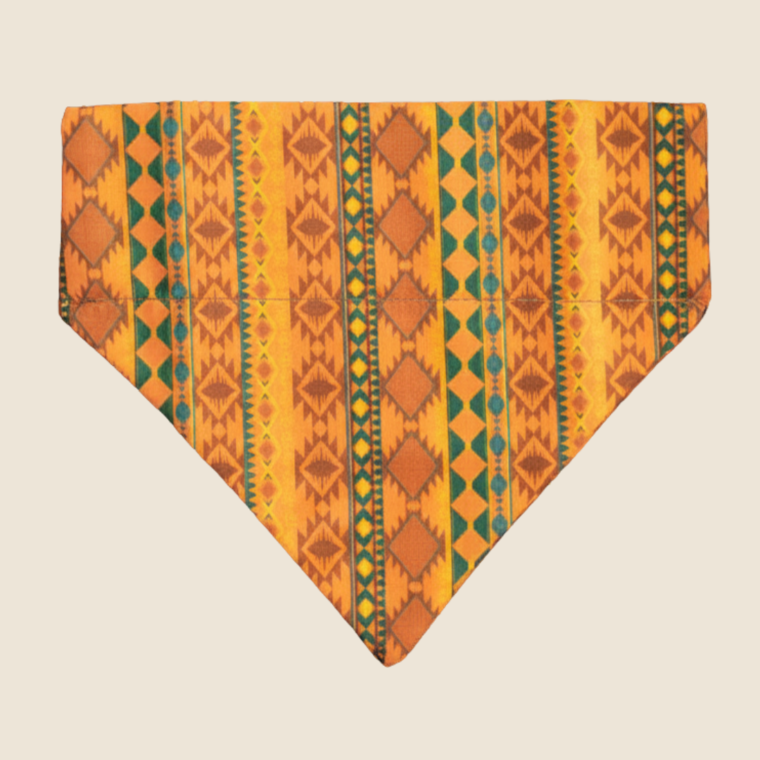Mountain Aztec dog bandana with orange and teal geometric print, shown flat