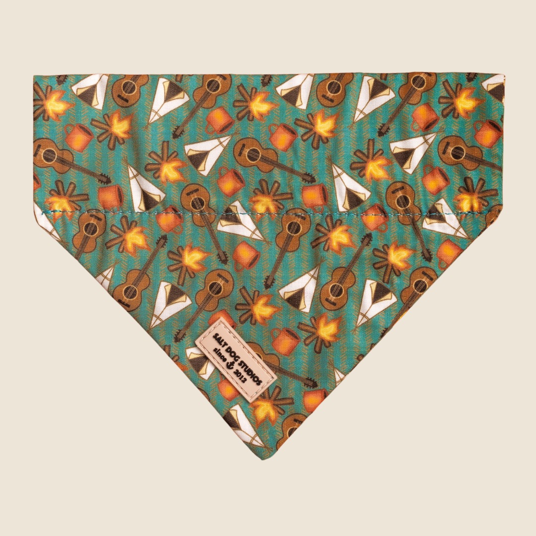 Mountain Camp Out dog bandana with teal and brown camping print, shown flat