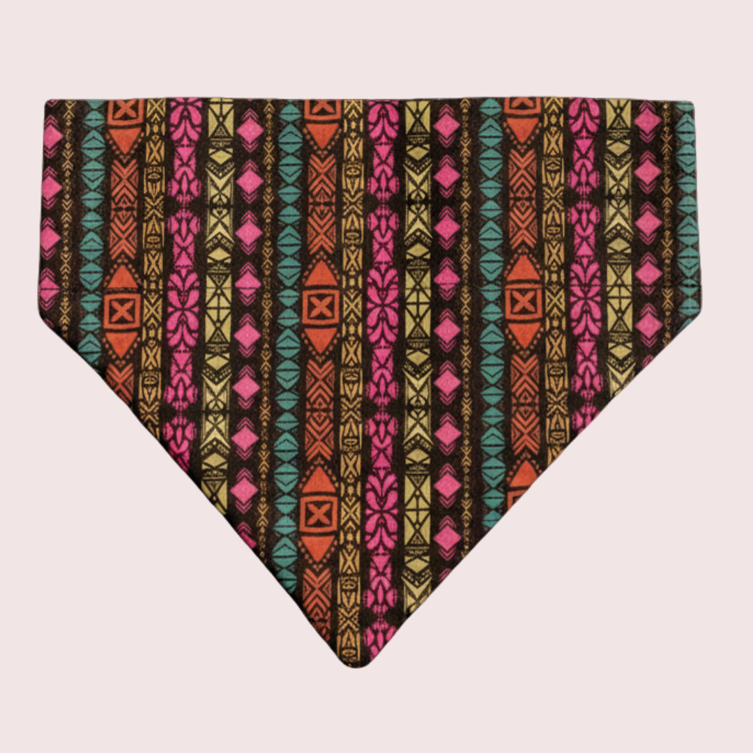 Retro Tribal dog bandana with pink and teal geometric print on black, shown flat