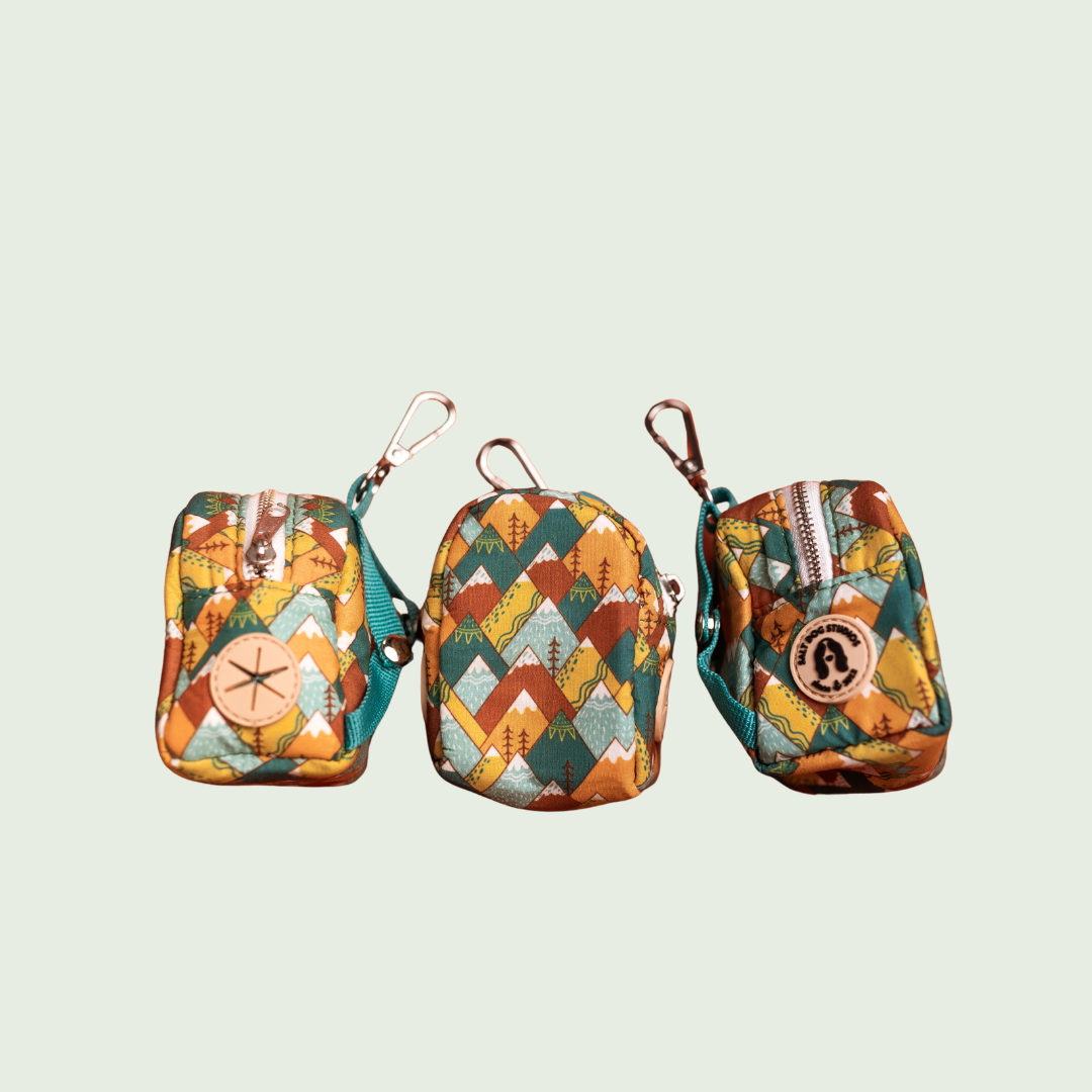 Mountain Range dog poo bag holder with teal and orange geometric mountain print, shown from three angles