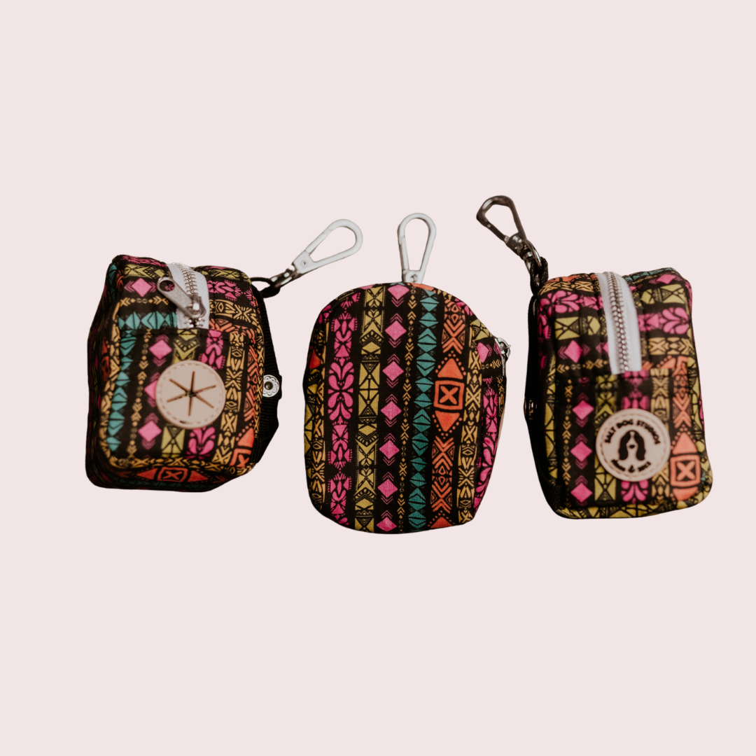 Retro Tribal dog poo bag holder with pink and teal geometric print on black, shown from three angles