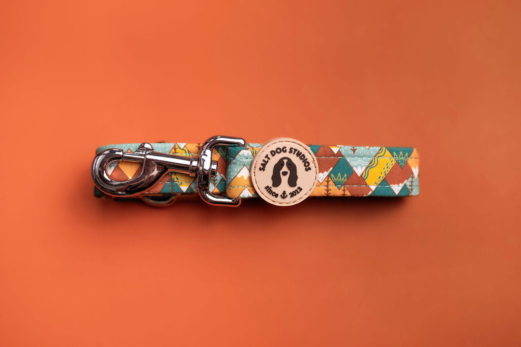 Mountain Range Dog Lead with earthy mountain and forest print, teal velvet handle and rust-proof fittings by Salt Dog Studios.
