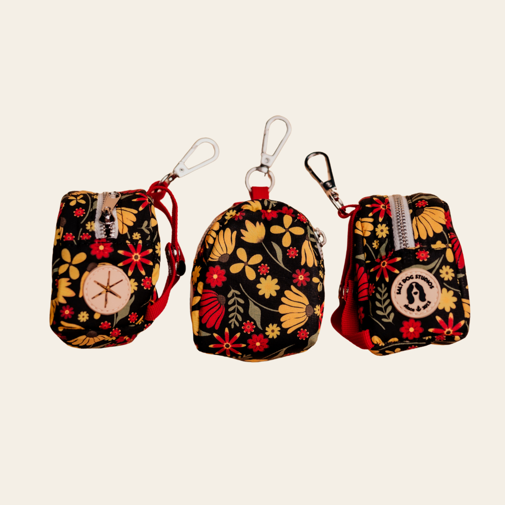 Folksy Flowers dog poo bag holder with colourful flowers on black, shown from three angles