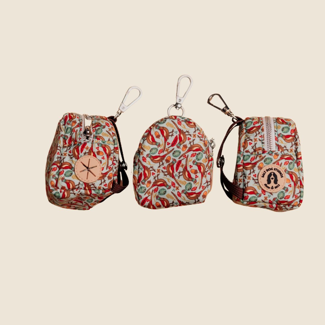Pheasants dog poo bag holder with red and green pheasant print, shown from three angles
