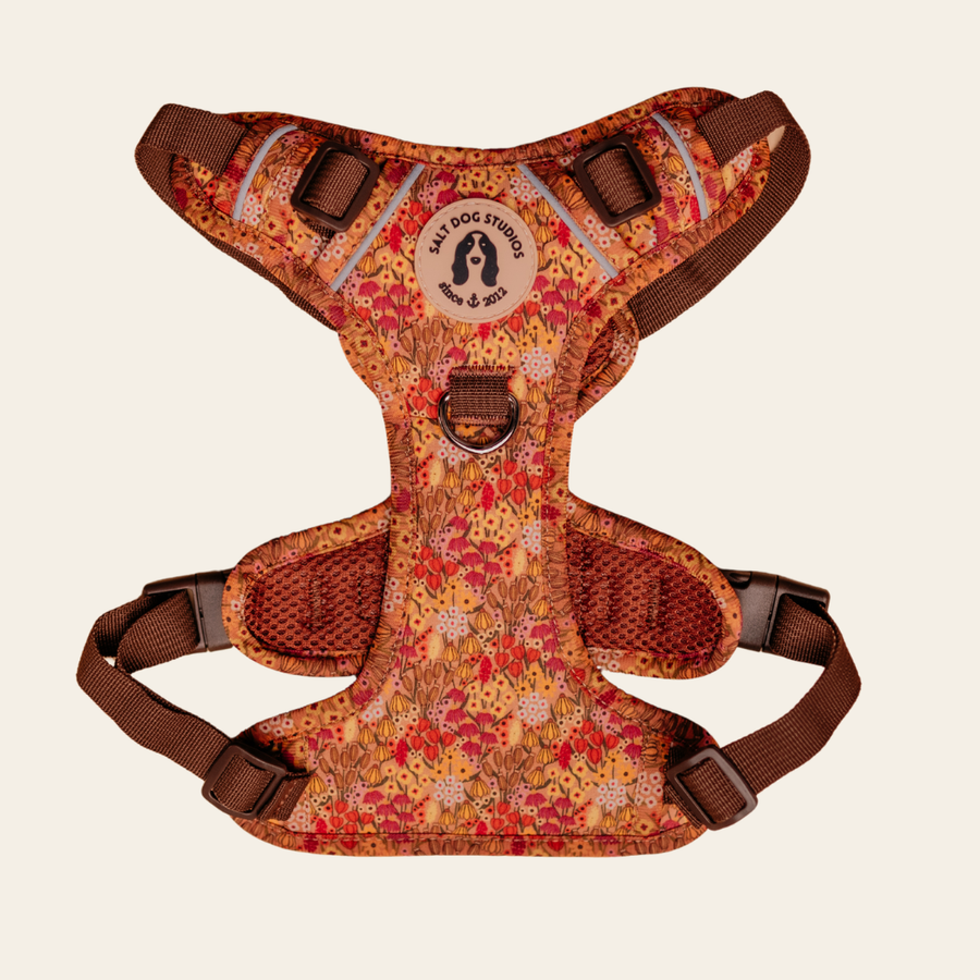 Wildflower Meadow dog harness with pink and gold floral print and adjustable straps