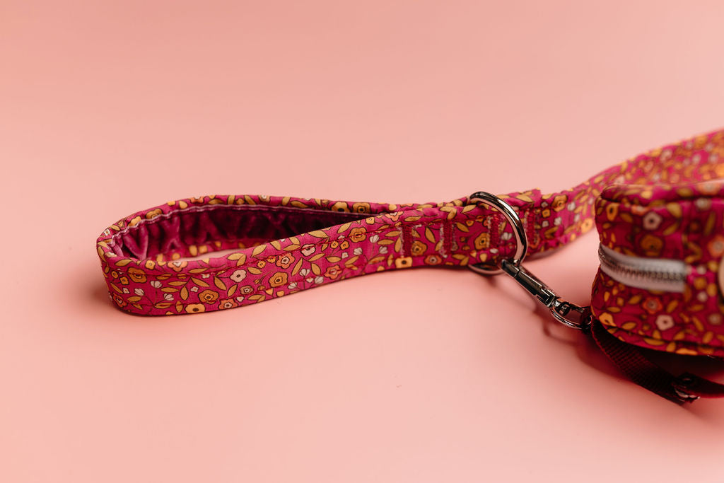 pink ditsy floral poo bag holder on lead